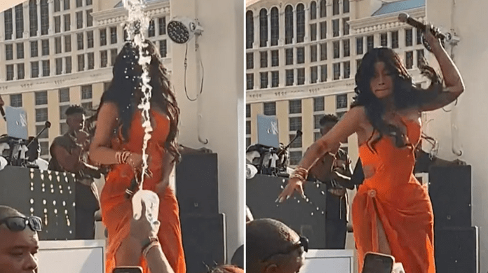 Rapper Cardi B throws microphone at fan who threw a drink at her onstage