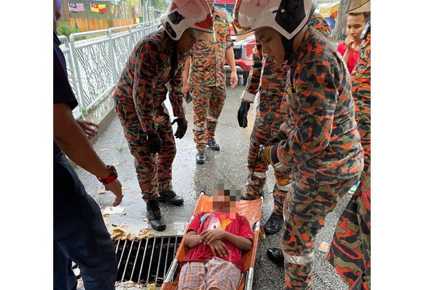 Fire and Rescue free 11-year-old boys leg from drain cover in PJ