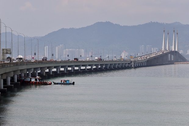 Fisherman saves woman who fell from Penang Bridge