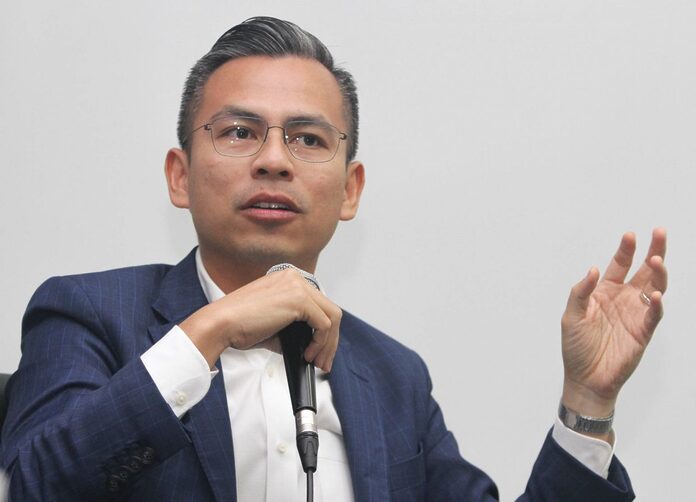 Muhyiddin agreed to waive Felda settlers debt, but Anwar signed off on it, says Fahmi