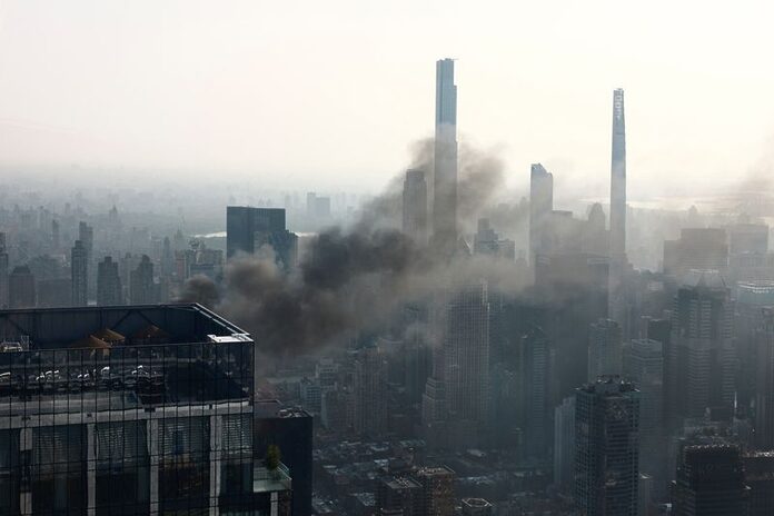 Crane collapses in New York City, at least two injured