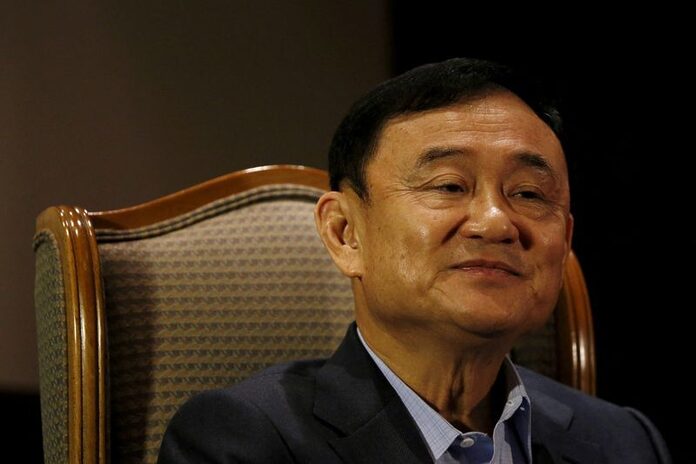 Plane carrying Thailand's exiled ex-PM Thaksin lands in Bangkok - media, live TV