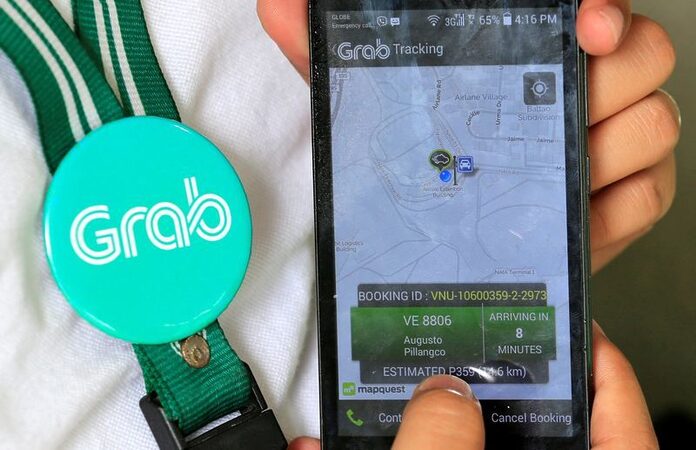 Singapore's Grab forecasts smaller operating loss this year