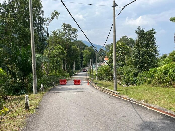 Road leading to Ayer Itam dam temporarily closed following freak storm