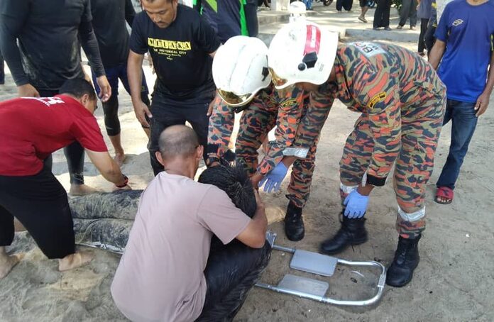 Two saved from drowning after boat capsizes off Teluk Batik