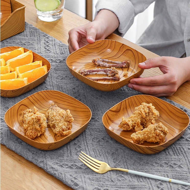 Creative Japanese imitation wood grain plastic bone spit plate snack plate fruit plate nut snack plate table storage