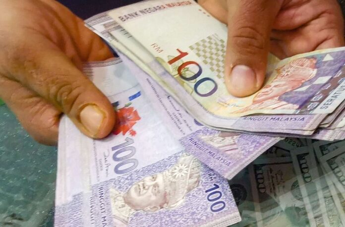 QuickCheck: Will RM100 monthly be given through MyKad to all Malaysians?